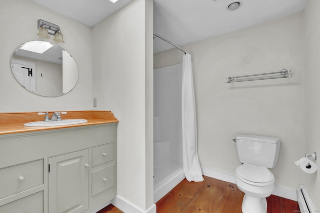 795 Rte 148, Killingworth, CT 06419 - full bathroom with a baseboard radiator, wood finished floors, vanity, and a shower stall