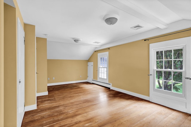 795 Rte 148, Killingworth, CT 06419 - additional living space featuring lofted ceiling, baseboard heating, plenty of natural light, and wood finished floors