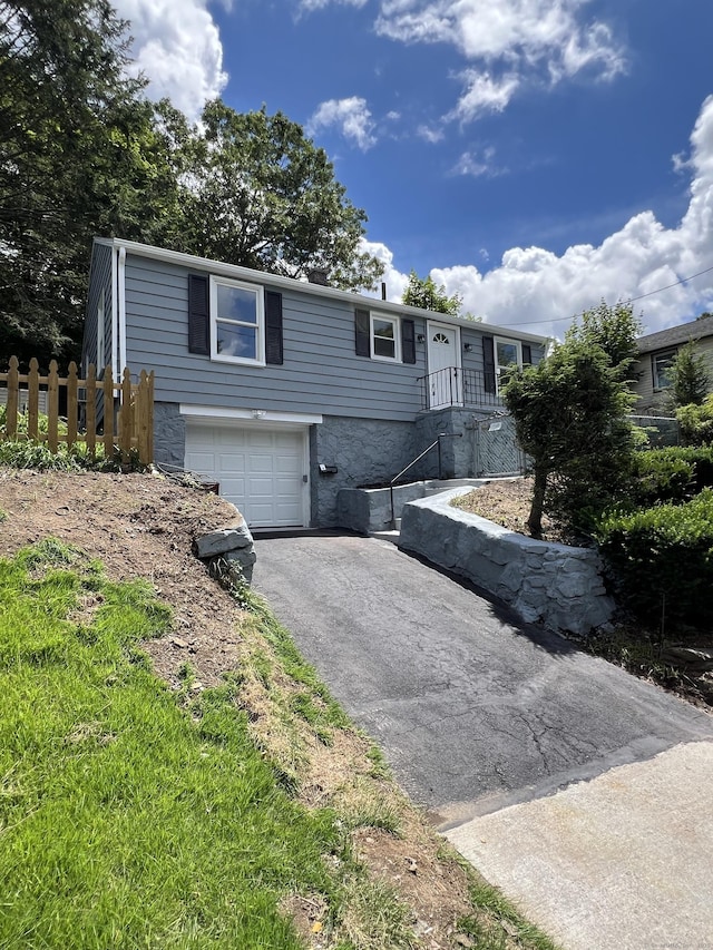 2308 N Main St, Waterbury, CT 06704 - single story home featuring driveway and a garage