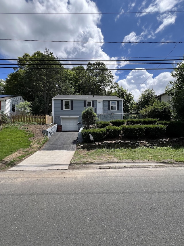 2308 N Main St, Waterbury, CT 06704 - manufactured / mobile home with an attached garage and driveway