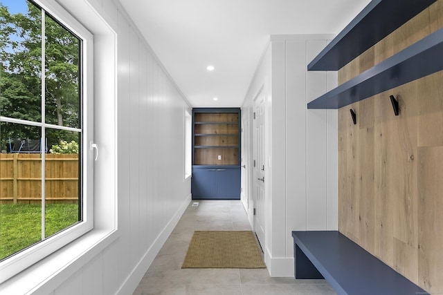 92 Westwood Rd, Fairfield, CT 06825 - mudroom with recessed lighting and a decorative wall