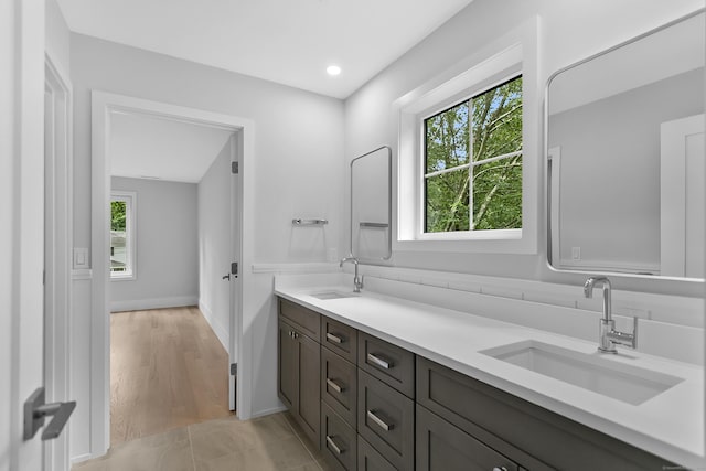 92 Westwood Rd, Fairfield, CT 06825 - full bath with healthy amount of natural light, double vanity, and recessed lighting