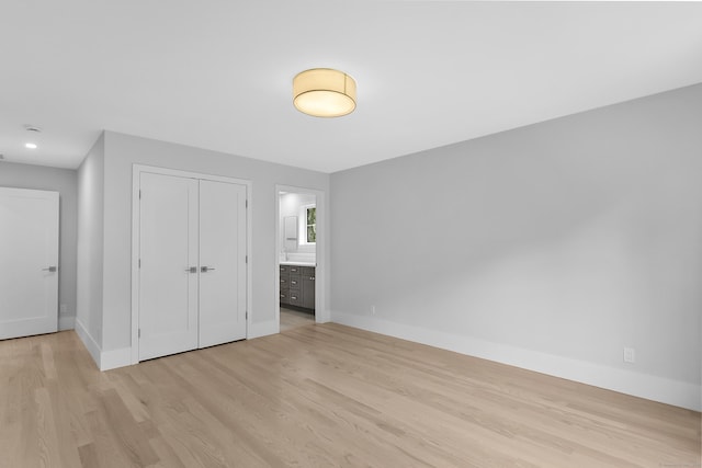 92 Westwood Rd, Fairfield, CT 06825 - unfurnished bedroom featuring light wood-style flooring, a closet, connected bathroom, and recessed lighting
