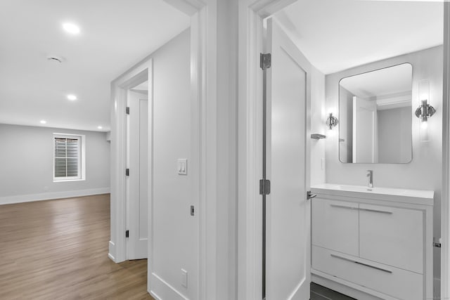92 Westwood Rd, Fairfield, CT 06825 - hallway featuring light wood-style flooring and recessed lighting