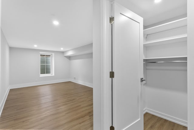 92 Westwood Rd, Fairfield, CT 06825 - below grade area featuring recessed lighting and wood finished floors