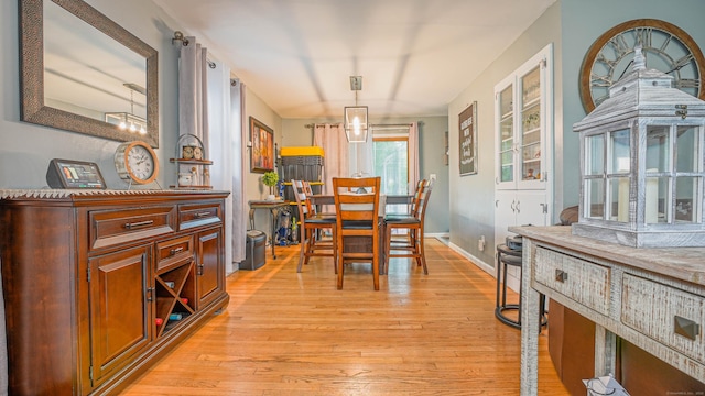 83 View Ter, East Haven, CT 06512 - dining area featuring light wood-type flooring and baseboards