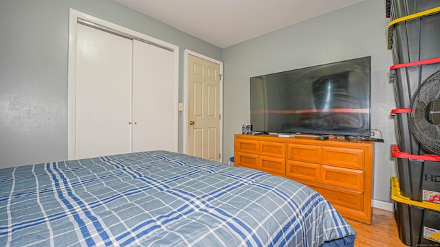 83 View Ter, East Haven, CT 06512 - bedroom with wood finished floors and a closet