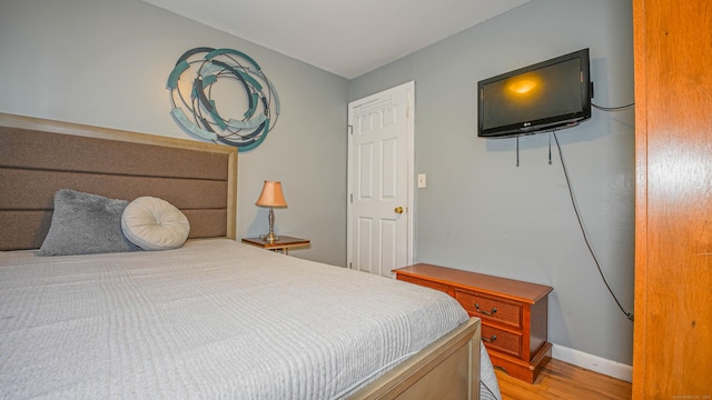 83 View Ter, East Haven, CT 06512 - bedroom with light wood-type flooring and baseboards