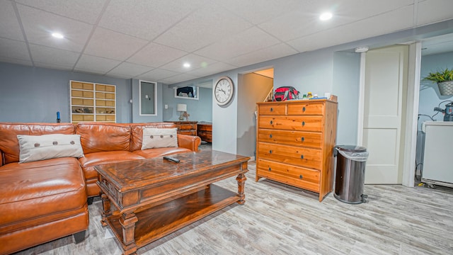 83 View Ter, East Haven, CT 06512 - living area featuring light wood finished floors, recessed lighting, washer / dryer, and a paneled ceiling