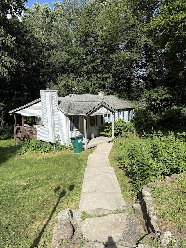 23 Merriman Ln, Prospect, CT 06712 - bungalow-style house featuring a chimney, a front yard, a porch, and a shingled roof