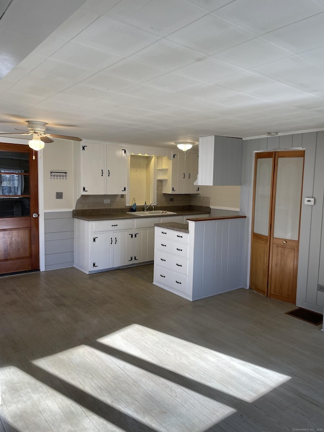 23 Merriman Ln, Prospect, CT 06712 - kitchen featuring dark countertops, dark wood-style flooring, white cabinetry, and a ceiling fan