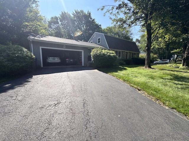 8 Juniper Rd, Windsor, CT 06095 - dutch colonial with a gambrel roof, driveway, an attached garage, a front lawn, and a shingled roof