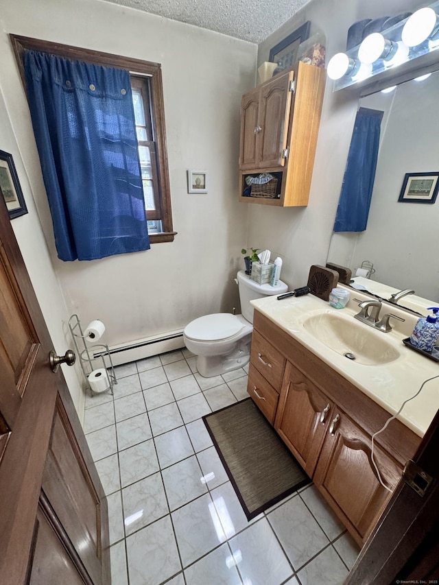 8 Juniper Rd, Windsor, CT 06095 - bathroom featuring a baseboard heating unit, vanity, a textured ceiling, and tile patterned floors