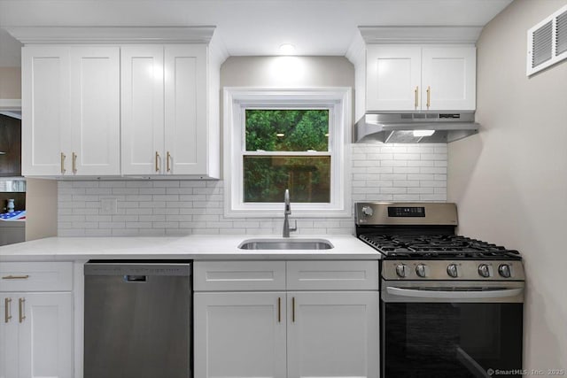 210 Highland Ave, West Haven, CT 06516 - kitchen with stainless steel appliances, under cabinet range hood, white cabinetry, and backsplash
