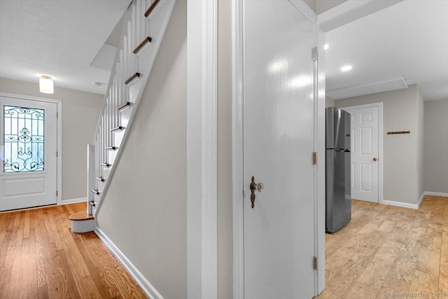 210 Highland Ave, West Haven, CT 06516 - entrance foyer featuring light wood finished floors and stairway