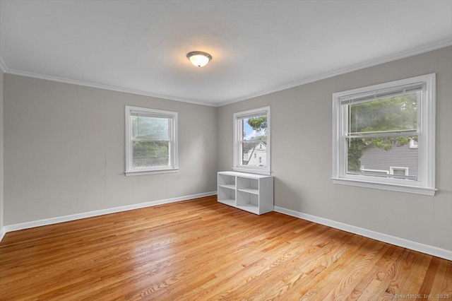 210 Highland Ave, West Haven, CT 06516 - unfurnished room featuring light wood-type flooring and crown molding