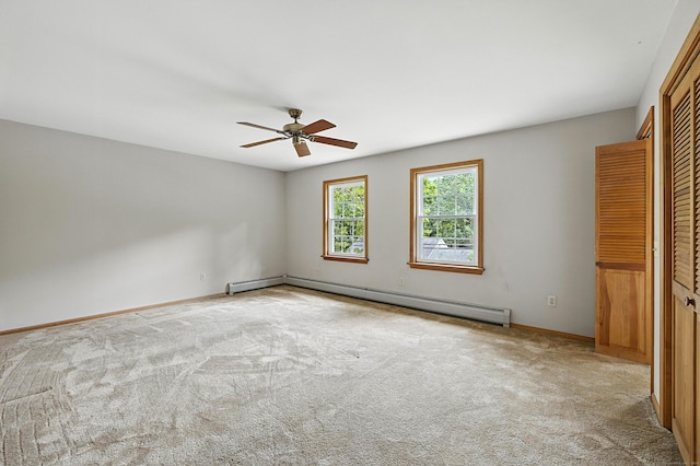 30 Park Rd, Oxford, CT 06478 - unfurnished bedroom with a baseboard heating unit, carpet, a closet, and ceiling fan