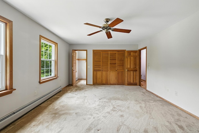 30 Park Rd, Oxford, CT 06478 - unfurnished bedroom featuring a baseboard heating unit, light carpet, a closet, and a ceiling fan