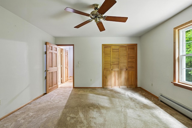 30 Park Rd, Oxford, CT 06478 - unfurnished bedroom featuring a baseboard heating unit, a closet, carpet flooring, and ceiling fan