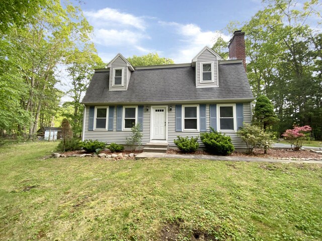 260 Stearns Rd, Mansfield, CT 06268 - view of front of property with a front lawn and a chimney