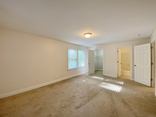 260 Stearns Rd, Mansfield, CT 06268 - unfurnished bedroom featuring carpet flooring, connected bathroom, and a closet