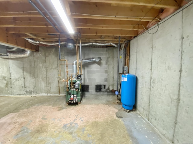 260 Stearns Rd, Mansfield, CT 06268 - unfinished basement with a water pressure tank and a heating unit