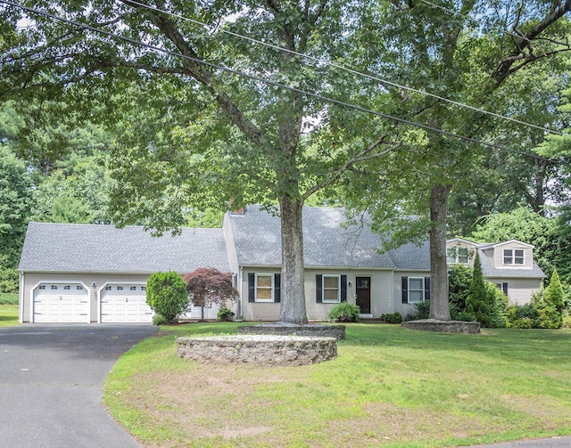 3 Olde Salem Dr, Somers, CT 06071 - view of front of home with driveway, an attached garage, a front lawn, and roof with shingles