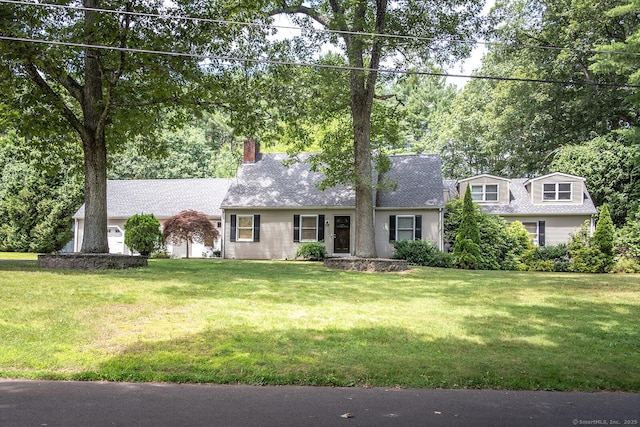 3 Olde Salem Dr, Somers, CT 06071 - new england style home with a front yard, a chimney, view of wooded area, and a shingled roof