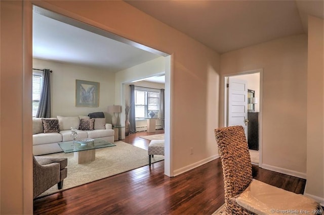 125 Marion St, Bridgeport, CT 06606 - living room with dark wood-style floors and baseboards