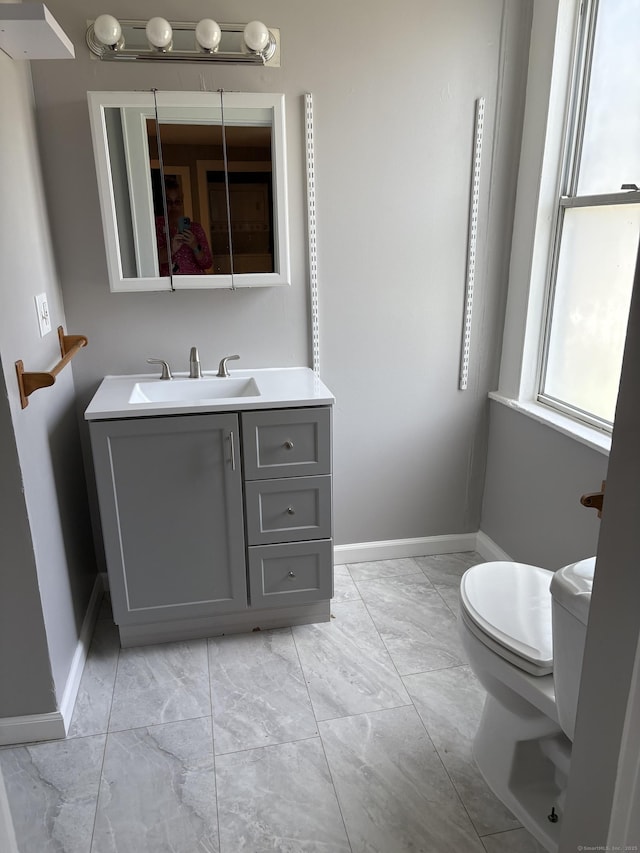 5 Quarry Ln, Portland, CT 06480 - bathroom with marble look tile flooring and vanity