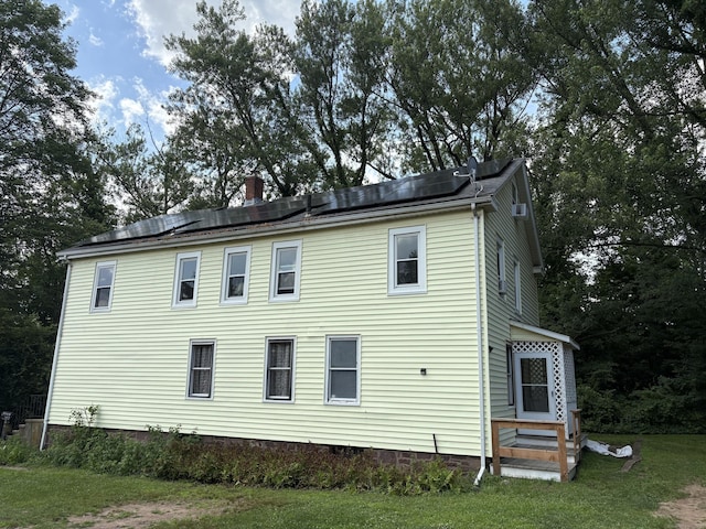 5 Quarry Ln, Portland, CT 06480 - view of side of home featuring crawl space, solar panels, and a yard