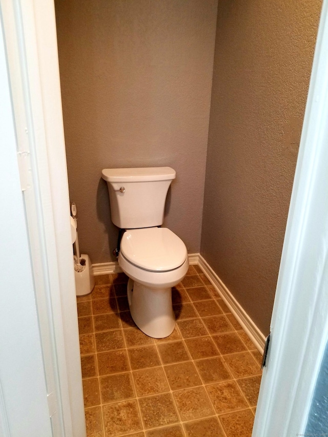 31 High St Apt 11206, East Hartford, CT 06118 - bathroom with tile patterned floors and a textured wall