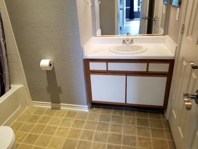 31 High St Apt 11206, East Hartford, CT 06118 - full bathroom with a textured wall, vanity, and shower / bath combination with curtain