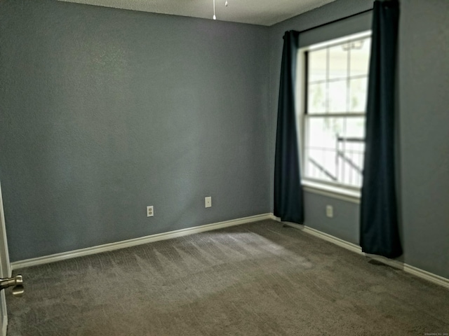 31 High St Apt 11206, East Hartford, CT 06118 - empty room featuring carpet floors and healthy amount of natural light