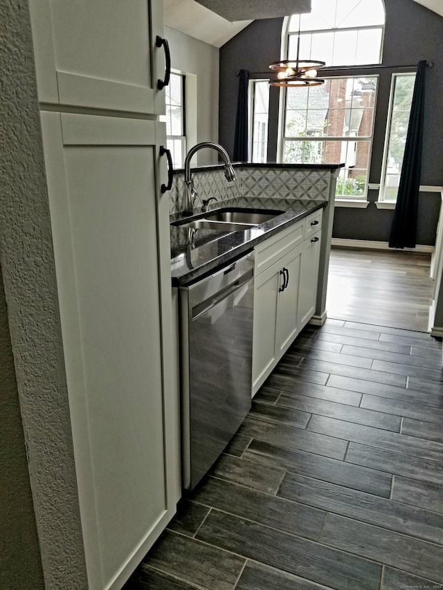 31 High St Apt 11206, East Hartford, CT 06118 - kitchen featuring dishwasher, dark wood-style flooring, dark countertops, plenty of natural light, and lofted ceiling