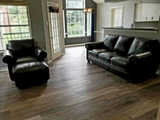 31 High St Apt 11206, East Hartford, CT 06118 - living area featuring dark wood-style flooring and baseboards