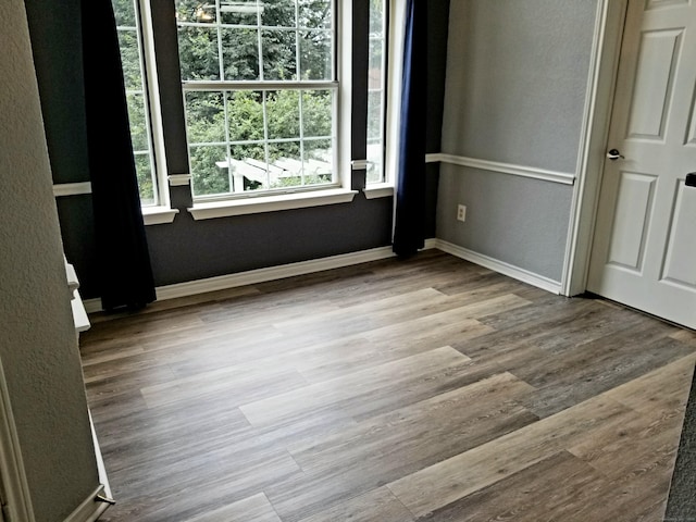 31 High St Apt 11206, East Hartford, CT 06118 - spare room featuring wood finished floors and baseboards