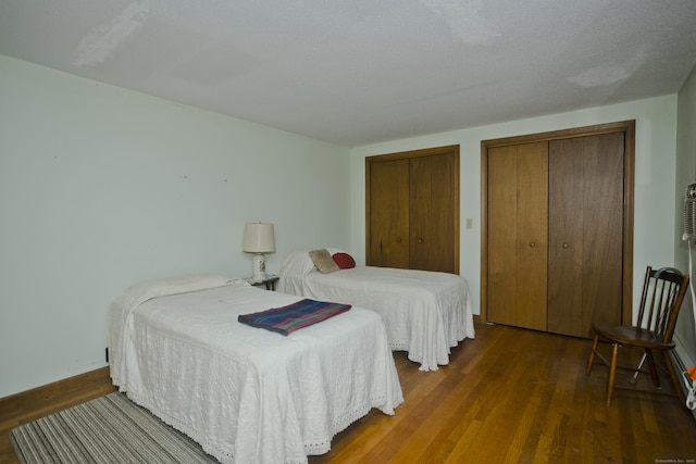 9 Mountain Rd, Granby, CT 06060 - bedroom with multiple closets and wood finished floors