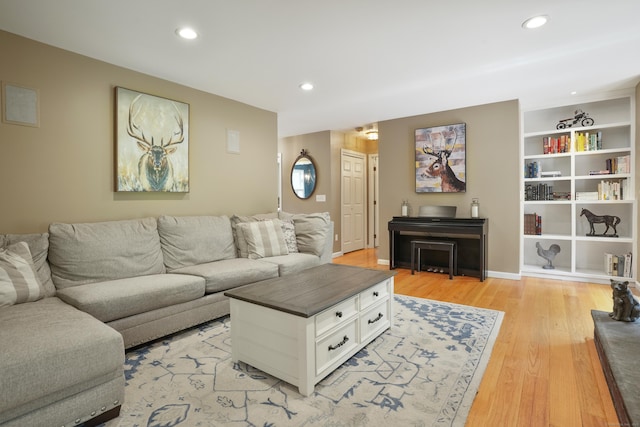 731 N Park Ave, Redding, CT 06896 - living room with light wood-style flooring, recessed lighting, and built in shelves