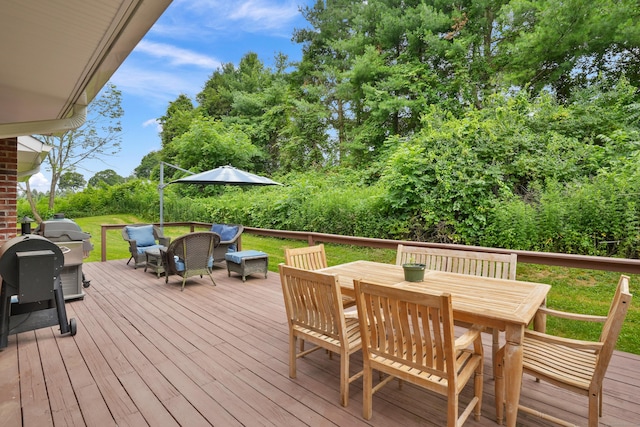731 N Park Ave, Redding, CT 06896 - wooden deck with outdoor dining area, a lawn, and an outdoor living space