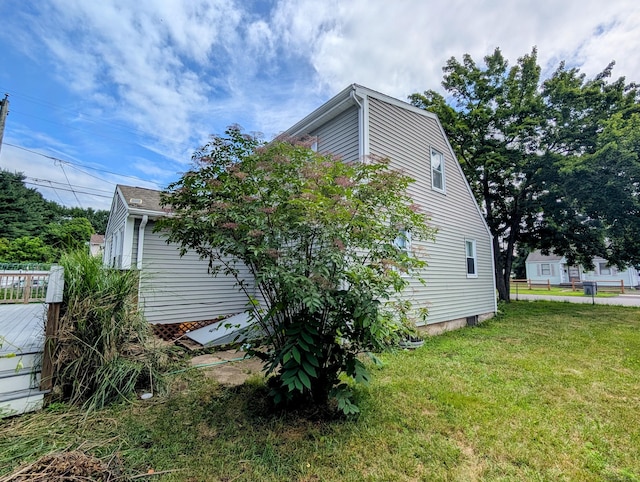 79 Dallas Ave, Plainville, CT 06062 - view of side of home featuring a yard and a wooden deck