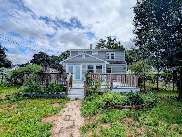 79 Dallas Ave, Plainville, CT 06062 - rear view of property featuring a deck and a chimney