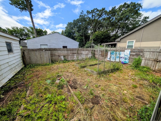 79 Dallas Ave, Plainville, CT 06062 - fenced backyard featuring a garden