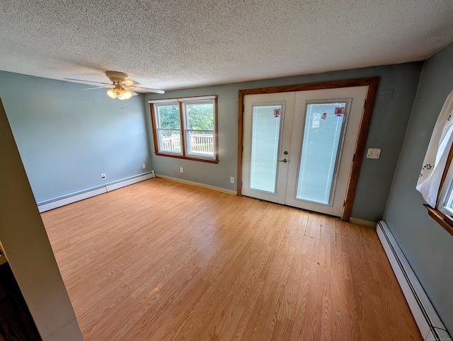 79 Dallas Ave, Plainville, CT 06062 - unfurnished room featuring a baseboard heating unit, light wood finished floors, a textured ceiling, french doors, and ceiling fan