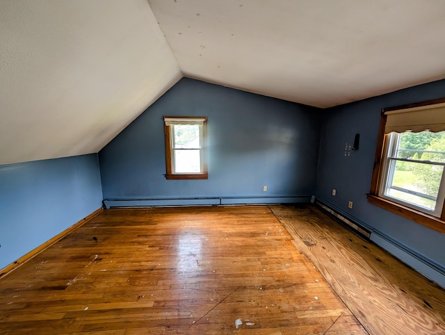 79 Dallas Ave, Plainville, CT 06062 - bonus room with hardwood / wood-style flooring, baseboard heating, healthy amount of natural light, and vaulted ceiling