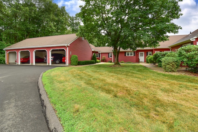 415 Lady Bug Ln Unit 415, Vernon, CT 06066 - single story home featuring a front yard, an outdoor structure, and driveway