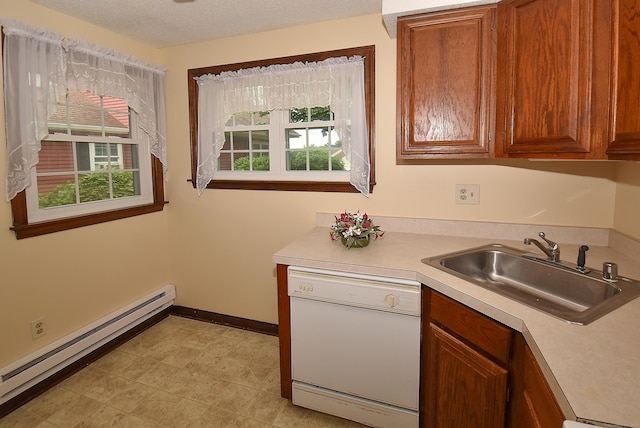 415 Lady Bug Ln Unit 415, Vernon, CT 06066 - kitchen with dishwasher, baseboard heating, light countertops, and brown cabinetry