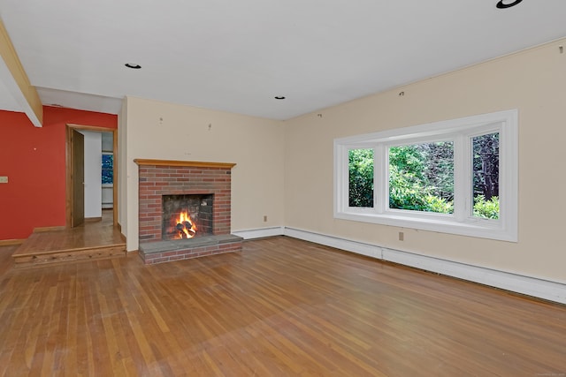 27 Tuttle Ct, Bethany, CT 06524 - unfurnished living room with wood finished floors, a fireplace, a baseboard heating unit, and recessed lighting