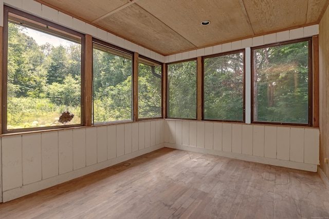 27 Tuttle Ct, Bethany, CT 06524 - unfurnished sunroom with healthy amount of natural light, wood finished floors, and wooden walls