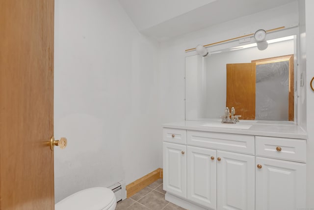 27 Tuttle Ct, Bethany, CT 06524 - bathroom featuring a baseboard heating unit, vanity, and tile patterned floors